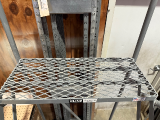 Used Uline 7 Step Rolling Ladder SWP