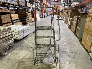 Used ULine 4 Step Rolling Ladder